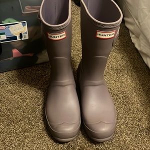 Hunter rain boots.